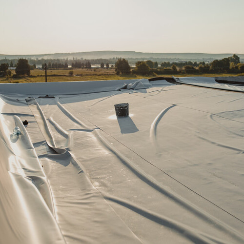 tpo roofing membrane being installed